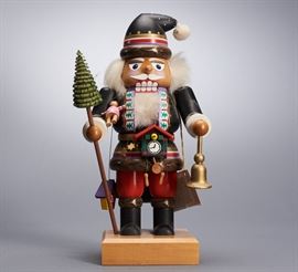 Offered is a wooden nutcracker from E.M. Merck. There are some light scratches in the paint. The original tag is attached and the bottom is signed by the artist. This item is sold as-is. Please see the photos for more details.