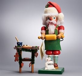 Offered is a vintage wooden nutcracker from Christian Ulbricht. The table is not attached to the base, and there is a zip-tie holding the figure together. The original tag is attached. This item is sold as-is. Please see the photos for more details.