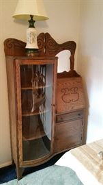 not antique display cabinet with pull down desk....