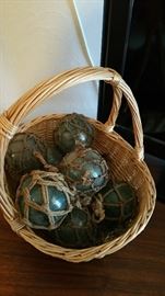 small glass floats with original rope netting, also the real deal