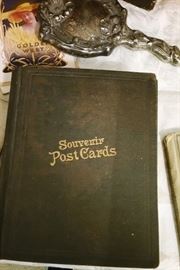 2" thick book of souvenir postcards - 4 per page - excellent condition - holidays of all kinds, humor etc