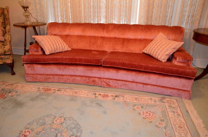 Curved full sized velvet sofa