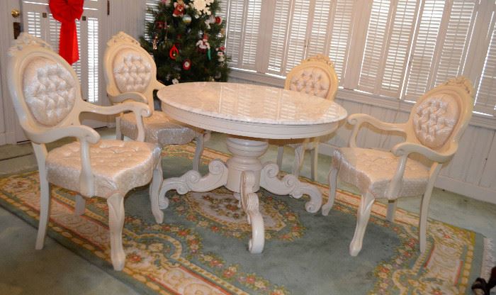 Marble top table with 4 ornate arm chairs