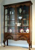 Queen Anne Burl Walnut Cabinet with Double Fan Carved Base. 48” Wide by 73” Tall.