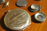 Watch Case, Compasses, and Coins