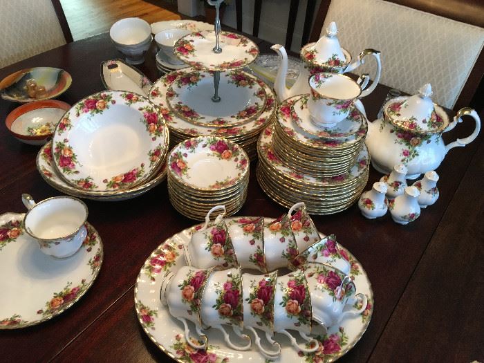 Royal Albert Old Country Rose China 12 Dinner plates, 6 bowls, 11 tea cups, Coffee pot, tea pot, 2 sets of salts and peppers, Butter, 2 tier server, serving bowls, 12 fruit bowls, 12 Salad plates, 12 Dessert plates, large serving dish