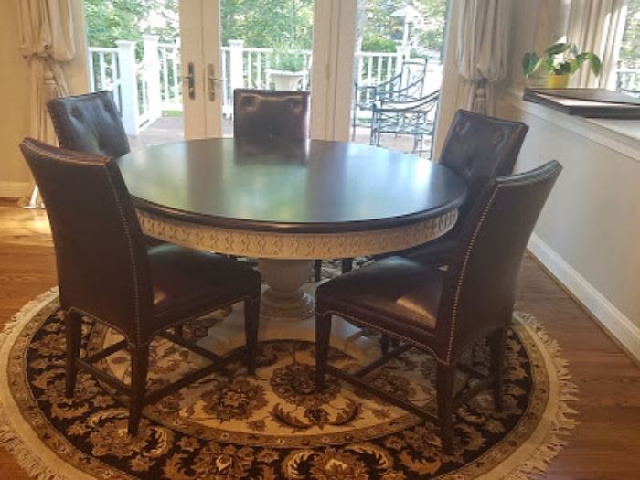 60" round wood dining table with pads. 5 Henredon leather chairs with nail heads.