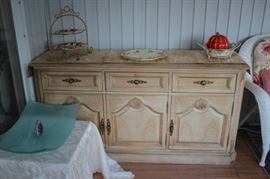 Wood Cabinet with Decorative Serving Pieces