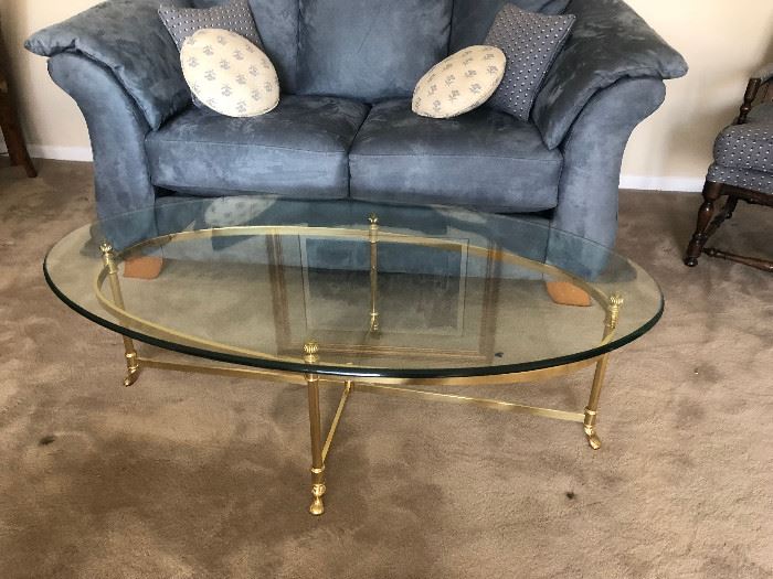 Glass and Brass footed oval table great for entertaining inside and out