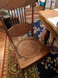 Leather bottom chairs with dragon design