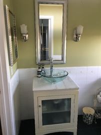 Modern styled vanity with glass bowl wash basin.  $250