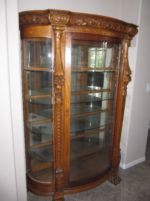 Available before sale. Oak curved glass display cabinet with great detail. 