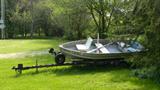 Aluminum fishing boat and trailer, 2001 Buick Century Ltd. with only 20,000 miles, leather interior, excellent condition