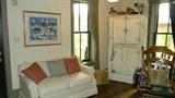 Lieper Furniture sleeper sofa, clean off white, primitive prints