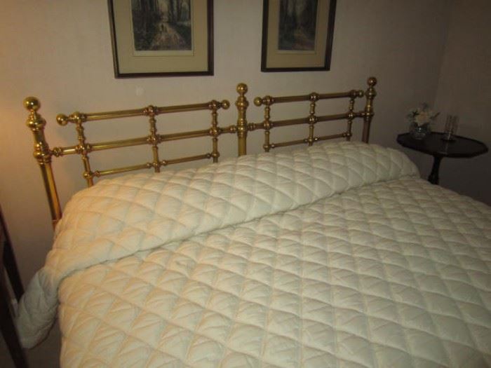King "looks like brass" bed. It's actually just painted gold. 