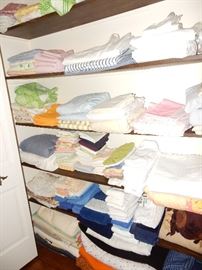One of 3 closets filled with linens