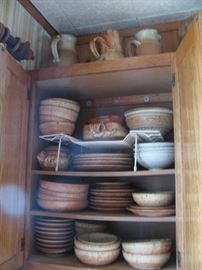 sample of art pottery and dishes, lots lots more this is just one cabinet
