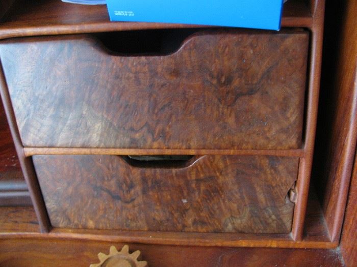 front of desk drawers, burled wood