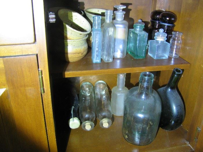part of selection of antique medicine and glass bottles