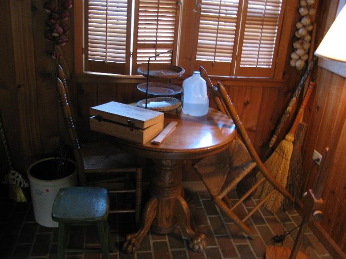great hairy paw small table and pair of ladder back chairs, garlic in back is ceramic 