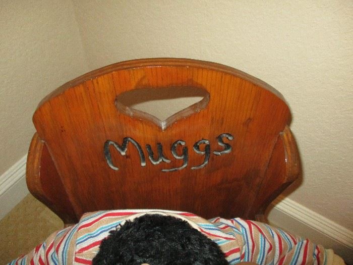 Muggs the Monkey's name on his chair