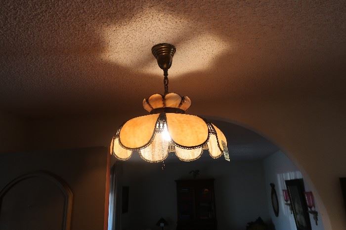 The antique light fixture is NOT FOR SALE.