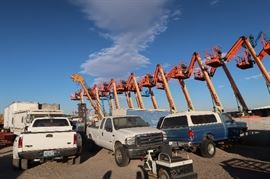 The lifts in the back ground are from the neighbor.  Those ARE NOT in this sale.