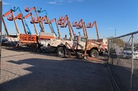 The lifts in the back ground are from the neighbor.  Those ARE NOT in this sale.