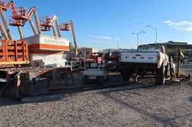 The lifts in the back ground are from the neighbor.  Those ARE NOT in this sale.