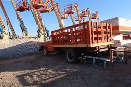 The lifts in the back ground are from the neighbor.  Those ARE NOT in this sale.