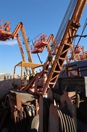 The lifts in the back ground are from the neighbor.  Those ARE NOT in this sale.