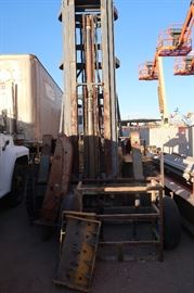 The lifts in the back ground are from the neighbor.  Those ARE NOT in this sale.