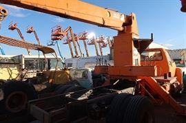 The lifts in the back ground are from the neighbor.  Those ARE NOT in this sale.