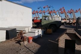 The lifts in the back ground are from the neighbor.  Those ARE NOT in this sale.