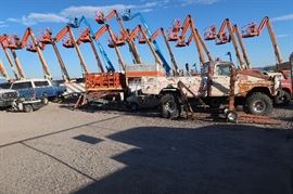 The lifts in the back ground are from the neighbor.  Those ARE NOT in this sale.