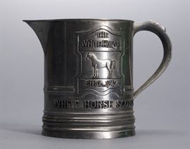 Offered is The White Horse Scotch Whiskey Stein made in Glasgow, Scotland. There is minor scratching to the metal and some corrosion. White Horse blended whiskey is brewed in Edinburgh and is noted for its use of the Lagavulin. Please see the photos for more details.