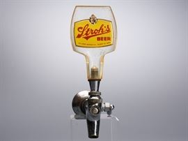 Offered is a vintage Stroh's Beer Tap Handle. The handle is acrylic with some minor scratching. The metal tap is in good condition but does have some minor scratching as well. Please see the photos for more details.