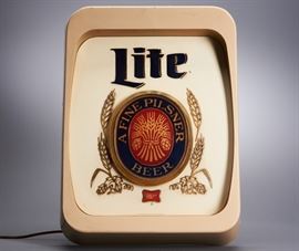 Offered is a vintage Miller Lite 'A Fine Pilsner' lighted sign in working condition. There are a few scratches to the sign. Please see the photos for more details.