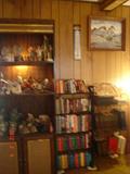 display cabinet and assortment of books