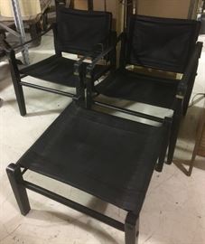 Pair of vintage "Campaign" chairs and ottoman.