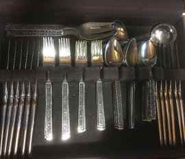 Sets of 1960's vintage stainless flatware. different patterns.