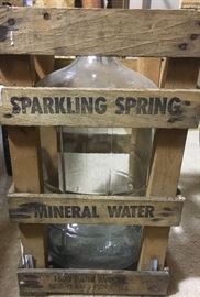 Highland Park Sparkling Spring jug and wood frame.