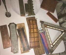 Collection of antique cribbage boards.