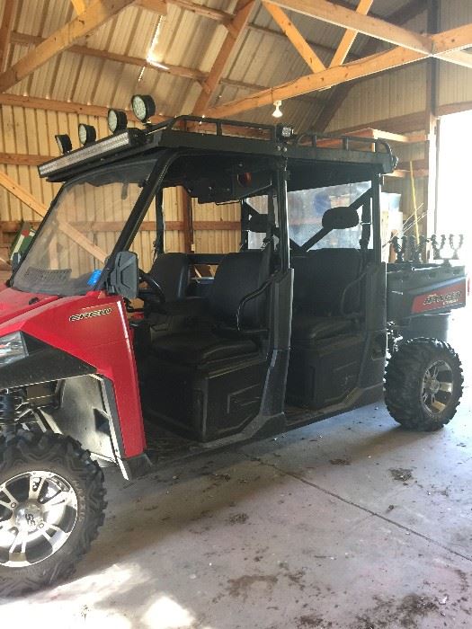 Polaris 2014 , equipped with blue tooth speakers, lights, lift kit, gun racks