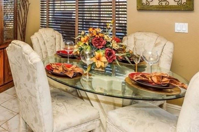 Glass kitchen table & 4 upholstered chairs (priced separately)