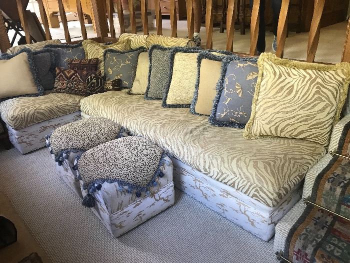 L-shaped custom upholstered sofa and ottomans