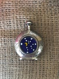Sterling snuff bottle with enamel stars and moon