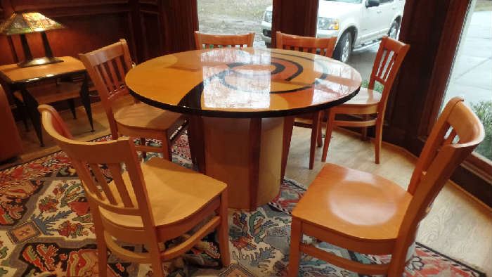 round art deco style table and chairs Table is $495, 6 Chairs $325