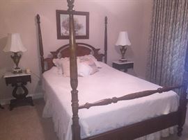 precious four poster double bed and matching marble top bedside tables