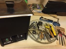 Jewelers tools plus a professional jewelry cleaner